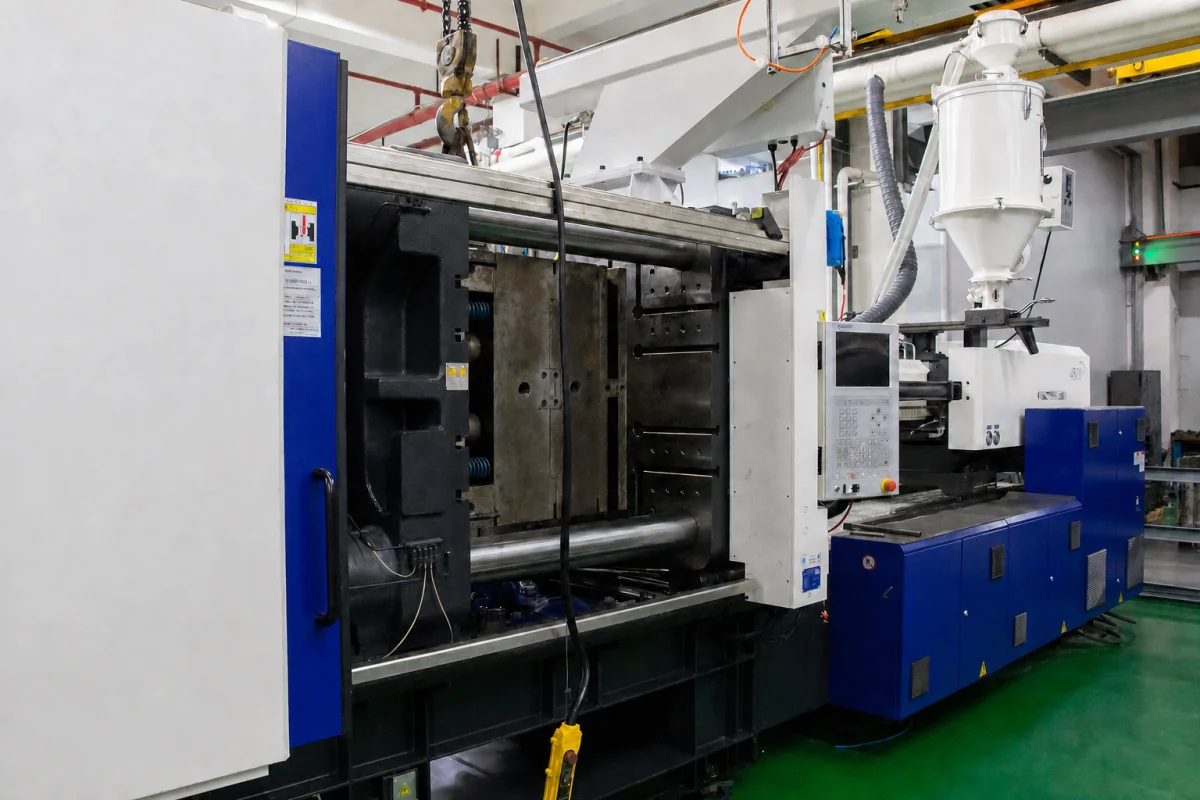 Open injection mold mounted in a press for condition and fit review