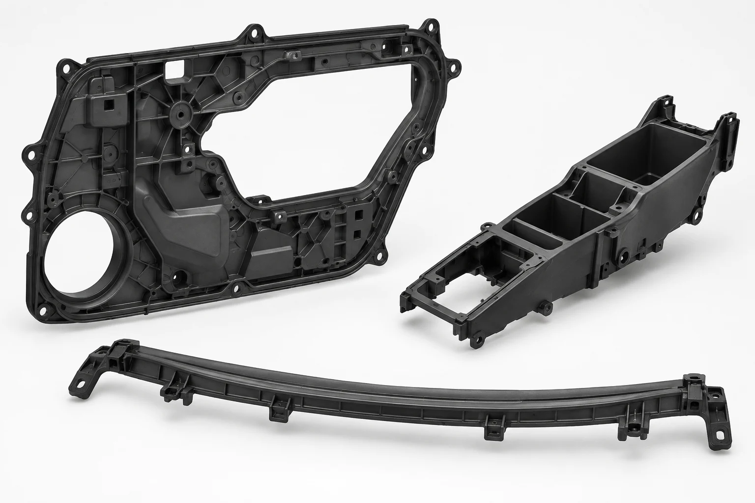 Illustrative group of a door inner carrier, center-console carrier and sunroof support with different mounting geometries
