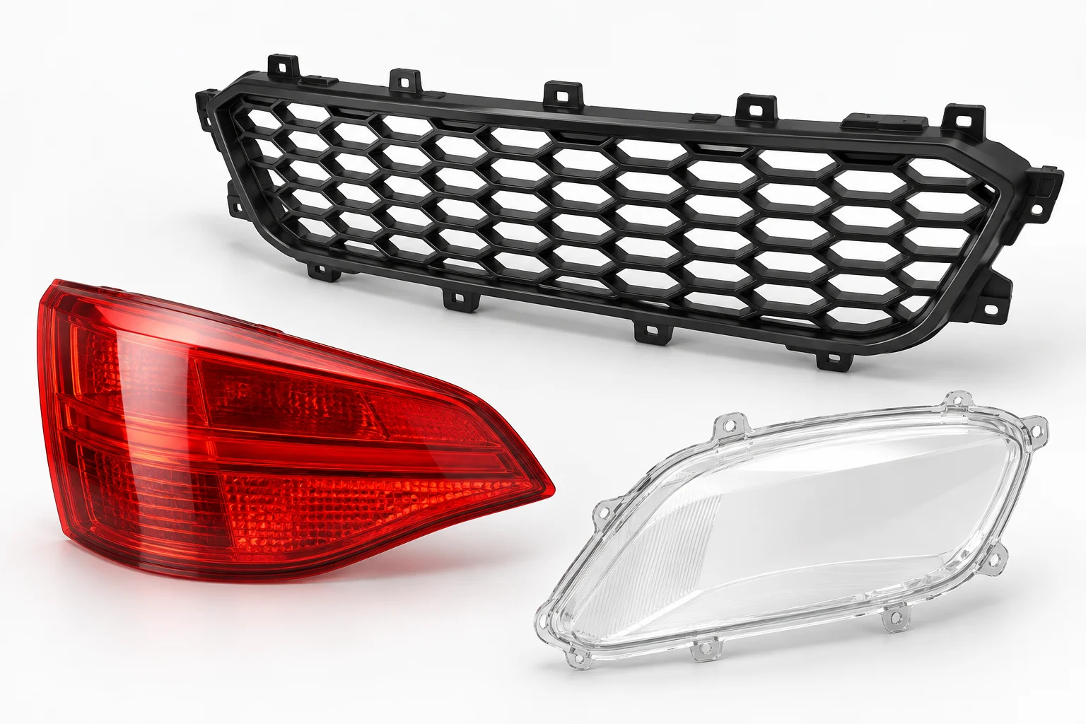 Illustrative red and clear lamp covers beside a black honeycomb exterior grille