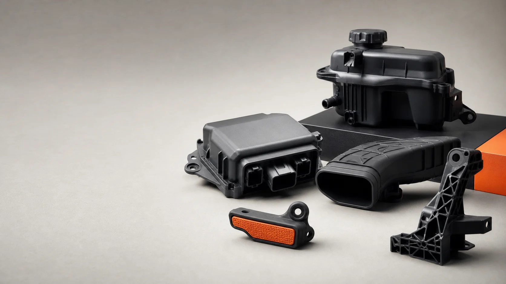 Representative automotive plastic housings, duct and bracket components